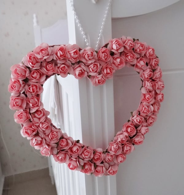 coração de flores rosas