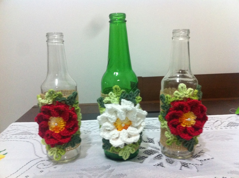 garrafa decorada com flor