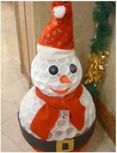 Boneco de neve vestido de Papai Noel